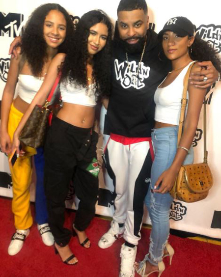 Ginuwine with his three daughters